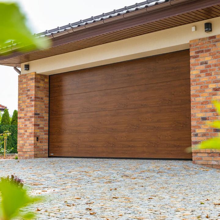 Jakie są koszty bramy garażowej z montażem? Sprawdź, na co zwrócić uwagę!