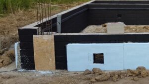 Jakie są koszty odkopania i izolacji fundamentów w 2026 roku?